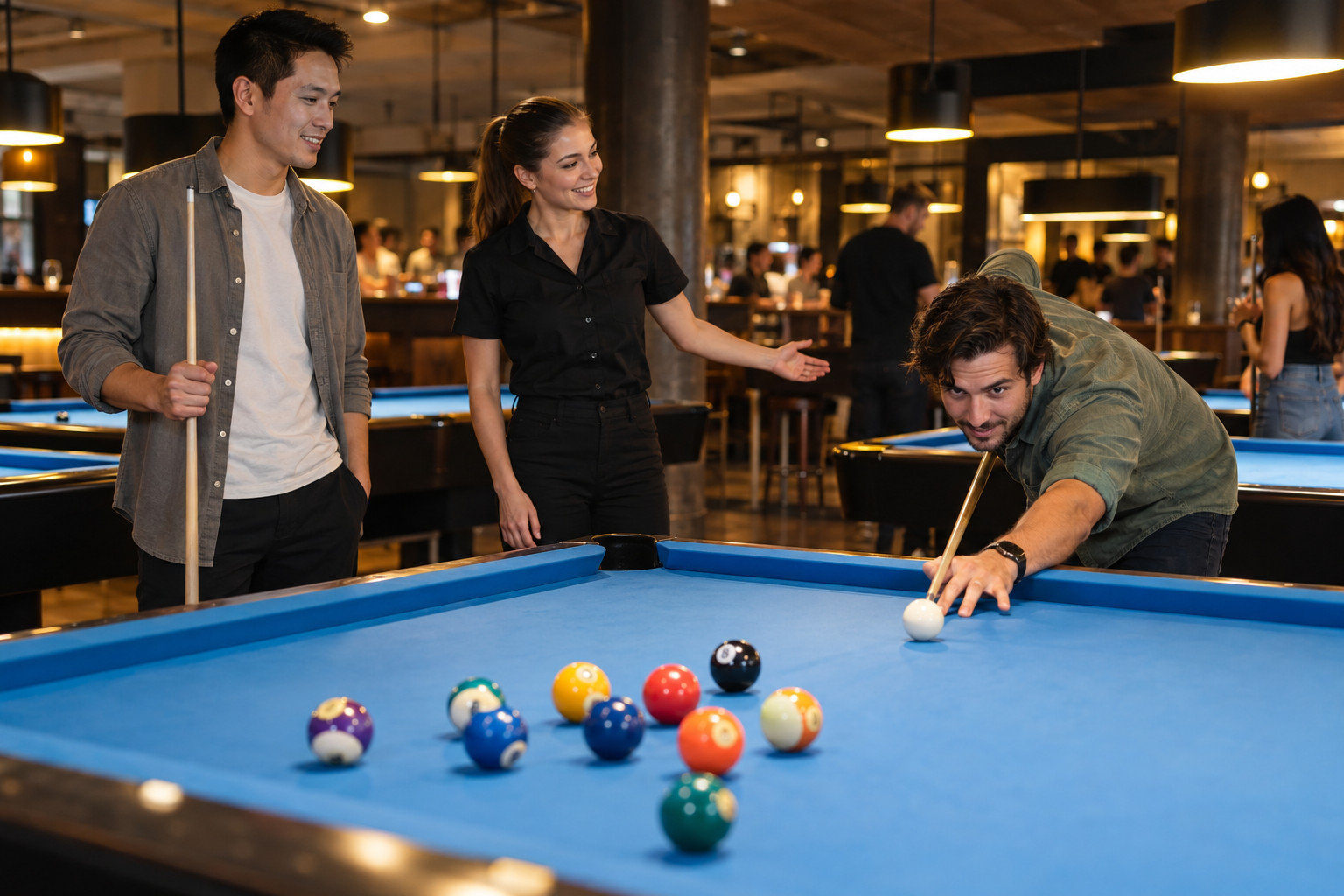 Friends beginning a game at an indoor pool venue